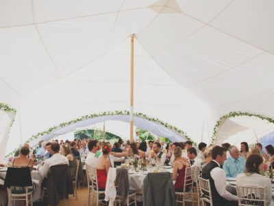 Wedding guests enjoying a Capri Marquee hired from Taddle Farm TEnts